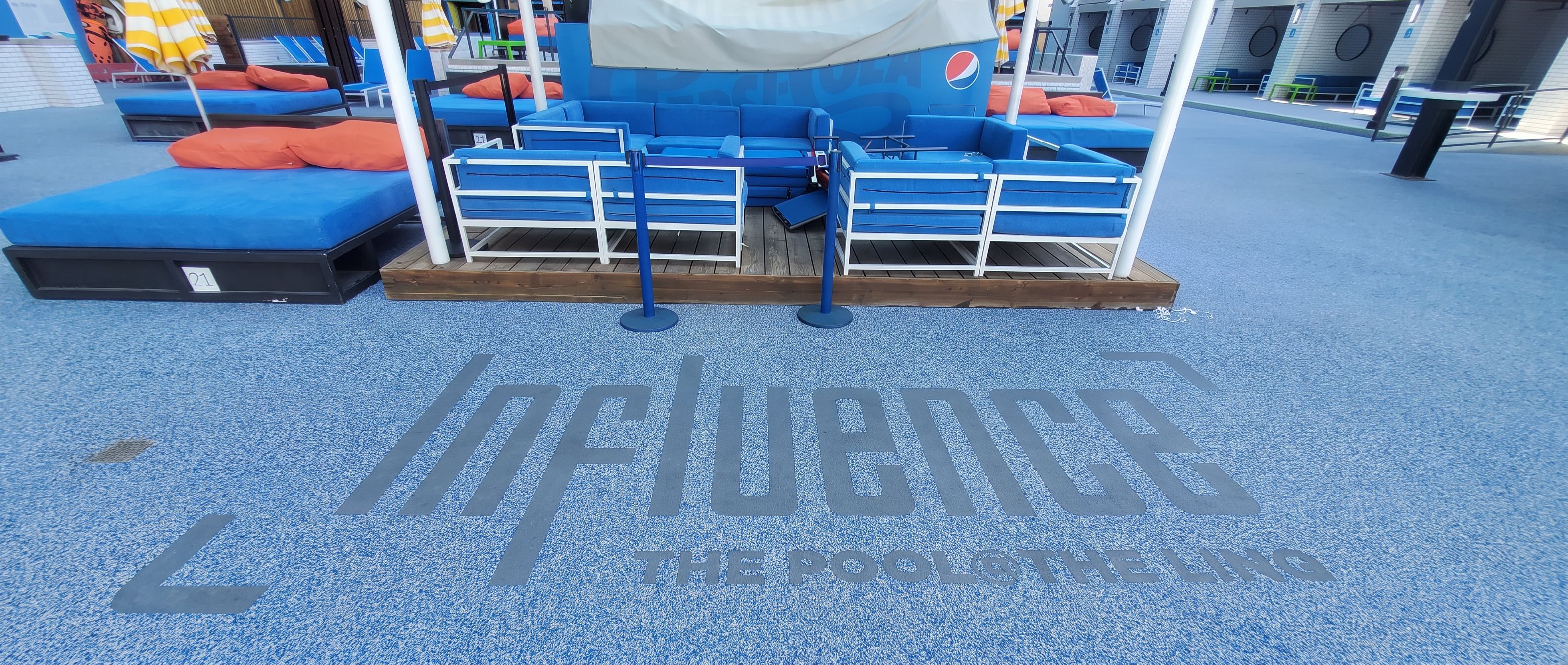 Influencer pool deck with custom logo surfacing