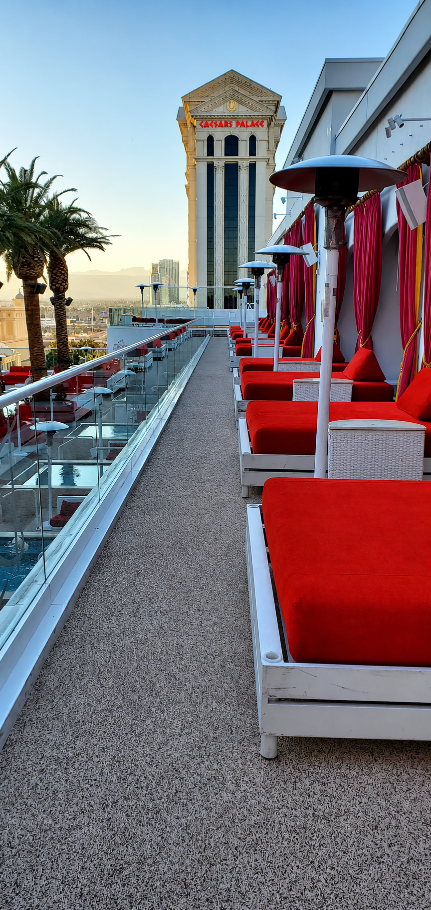 Drais Beachclub VIP cabanas with rubber surfacing and Caesars Palace tower