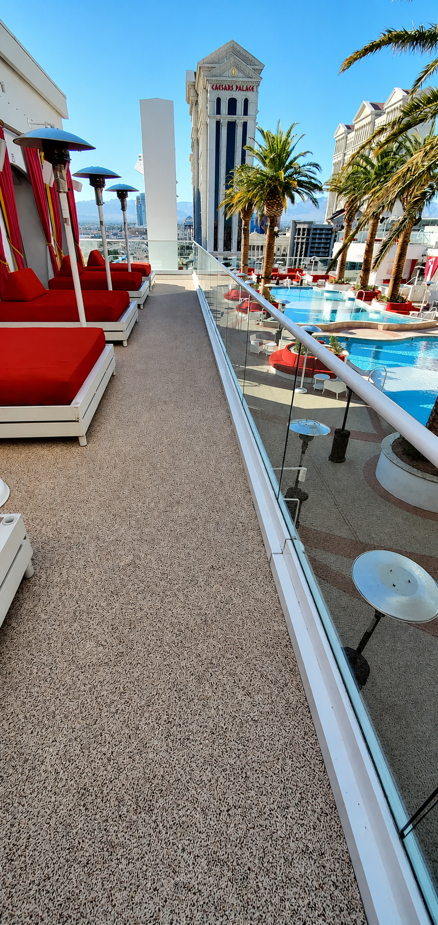 Drais Beachclub VIP lounge overlooking pool with Caesars Palace tower