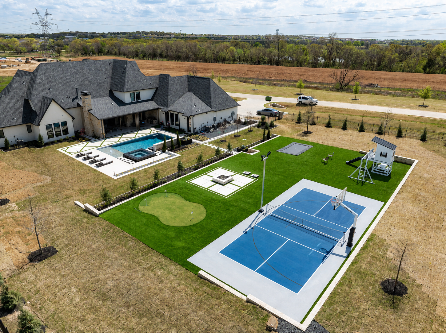 Estate with pool, basketball court, putting green, and playground